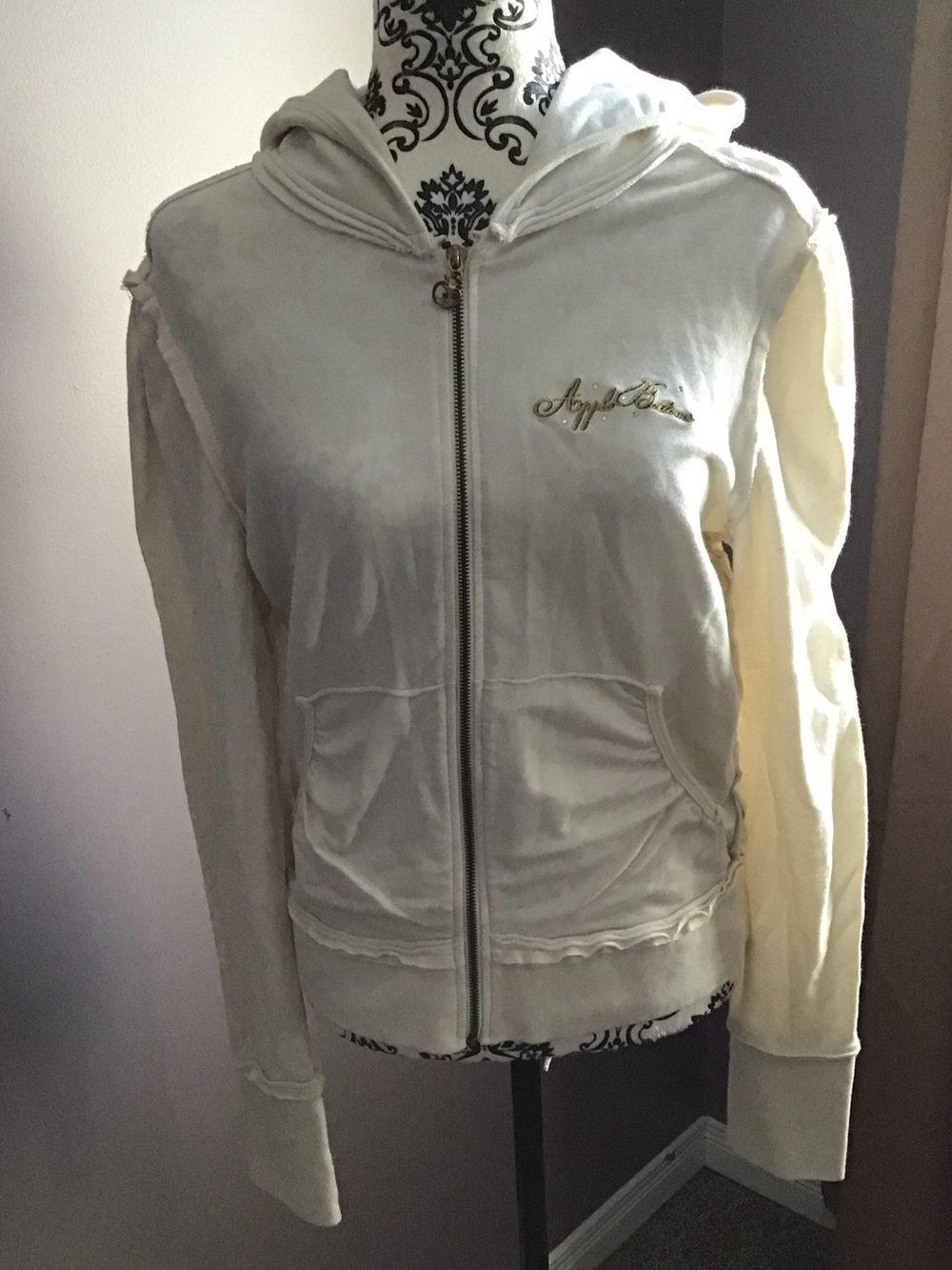 Womens zip long sleeve sweat shirt with wing motif